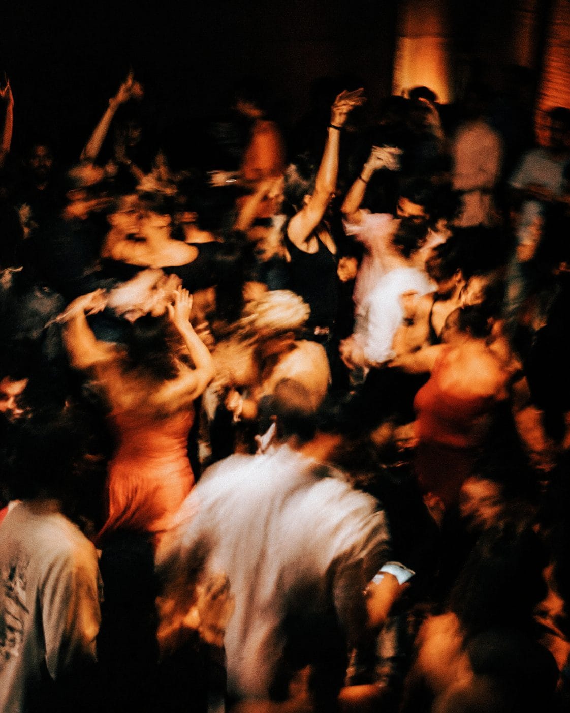 A crowded dancefloor, late