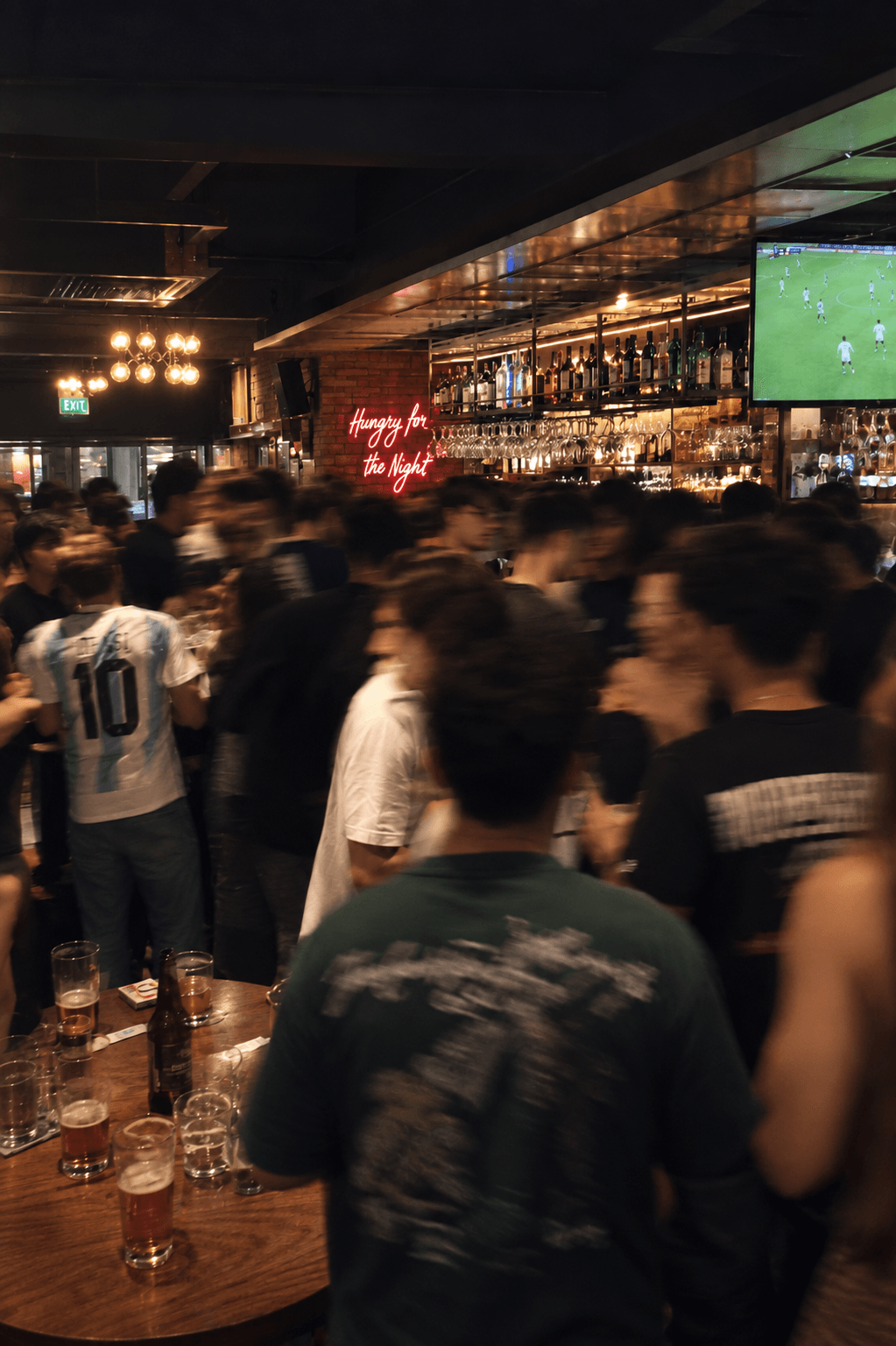 A crowd under one light